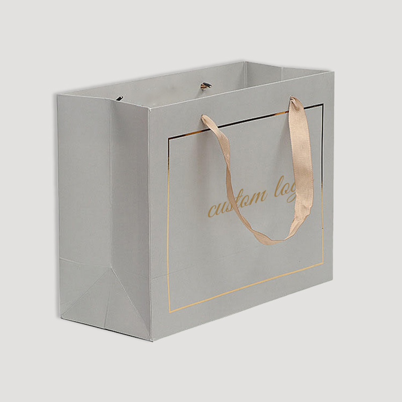 Luxury paper bag with gold logo